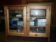 TV stand. Large pine TV stand with glass doors in....